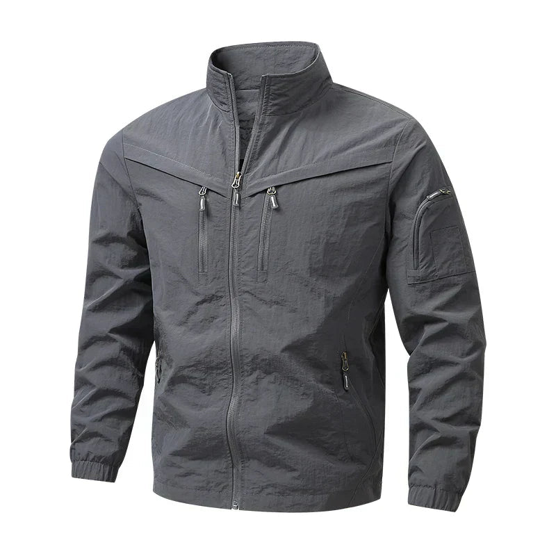 Men's stand-collar multi-pocket jacket, dark gray with zip front and side zip pocket.