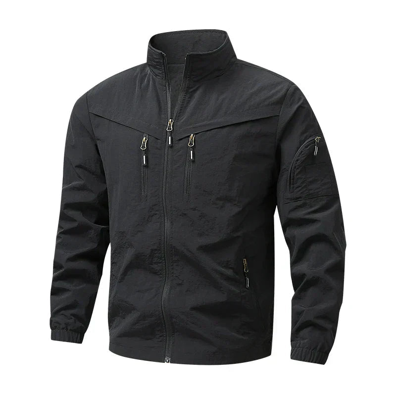 Men's stand-collar multi-pocket jacket, black with zip front and zip chest pockets.
