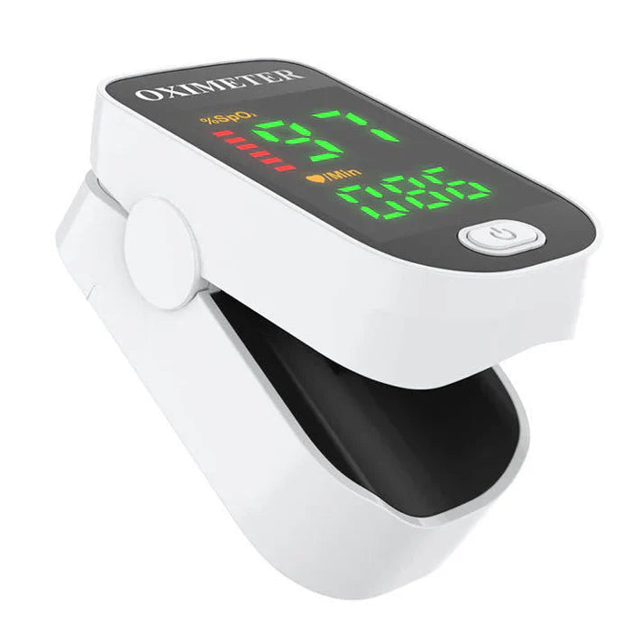 White LED pulse oximeter with angled finger clip and OLED screen with green readouts