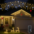 Warm white LED light curtain, draped overhead with dangling bulb strands