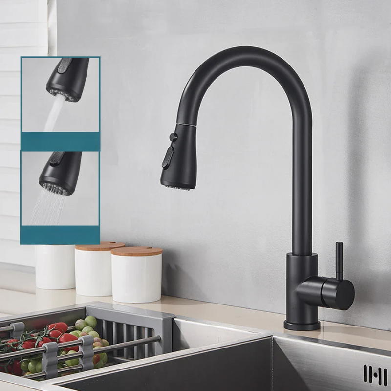 Black kitchen faucet with pull-out spray head in a modern kitchen setting.