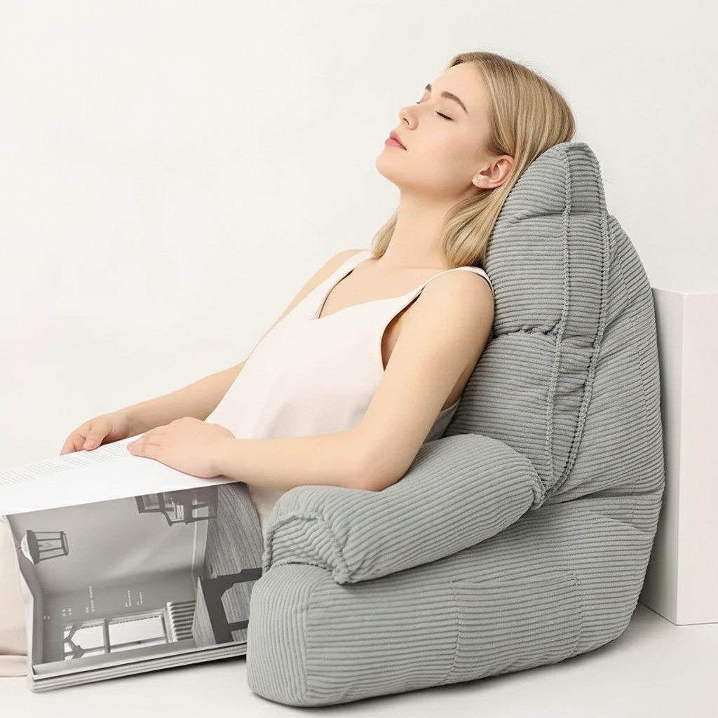 Grey striped memory foam lounge pillow with curved headrest and arm support