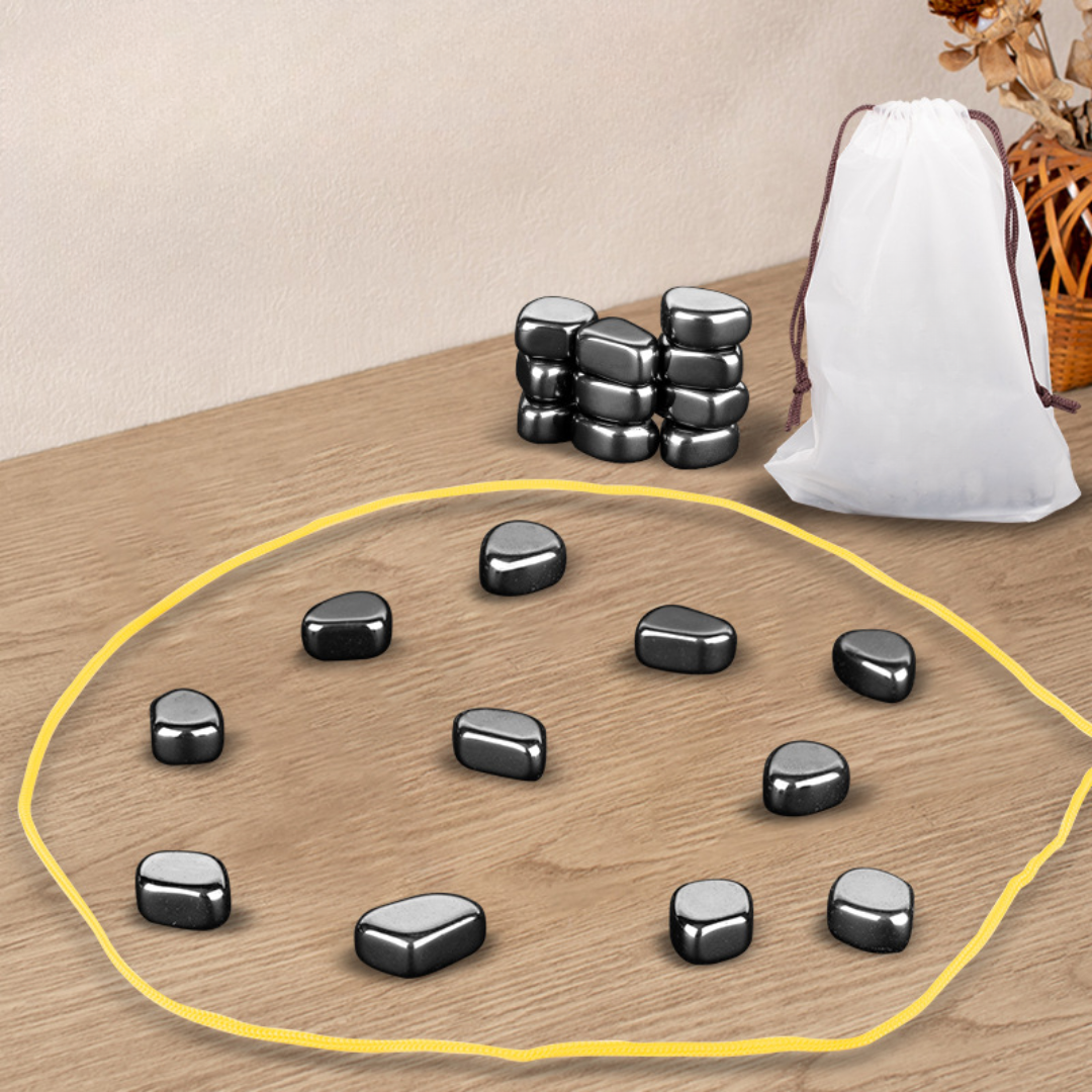 Magnetic strategy board game board with yellow ring and black magnetic stones