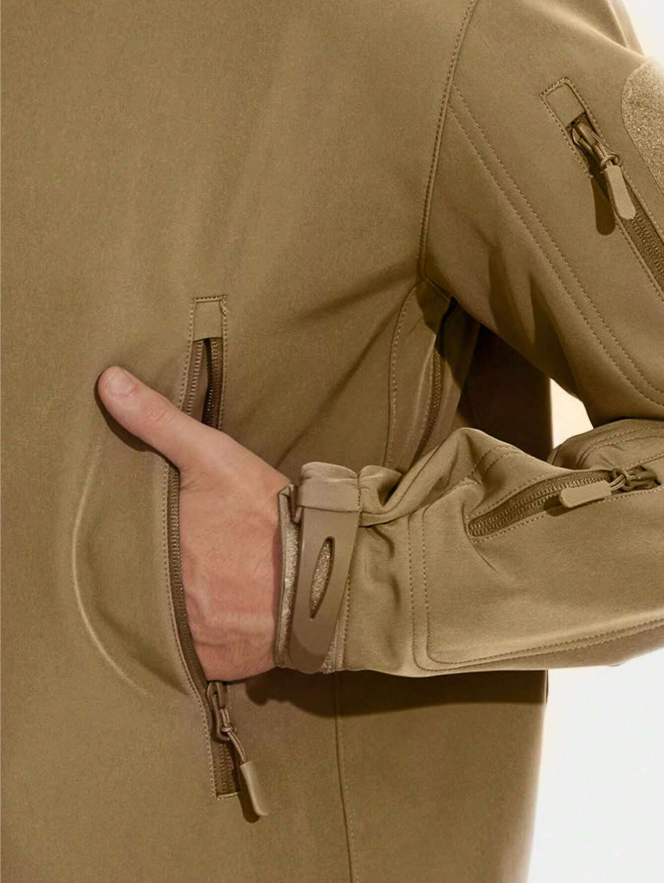 Beige fleece-lined outdoor jacket detail with front zipper and zip pocket
