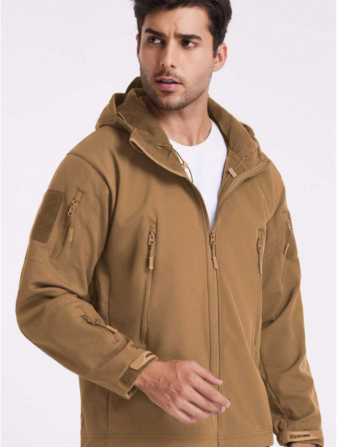 Tan outdoor jacket with hood and front zipper, utility pockets on sleeves and chest