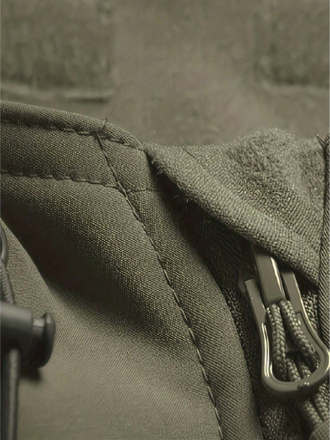 Waterproof fleece-lined outdoor jacket fabric detail with zipper and stitching