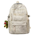 White graphic print backpack with MIXIC logo, front zip pockets and side straps