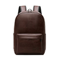 Brown vegan leather executive backpack, full front view with front zip pocket