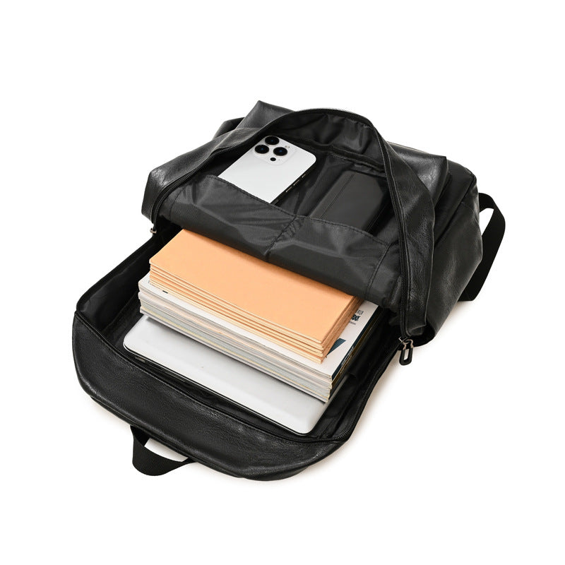 Black vegan leather backpack, open top with notebook and smartphone sleeves