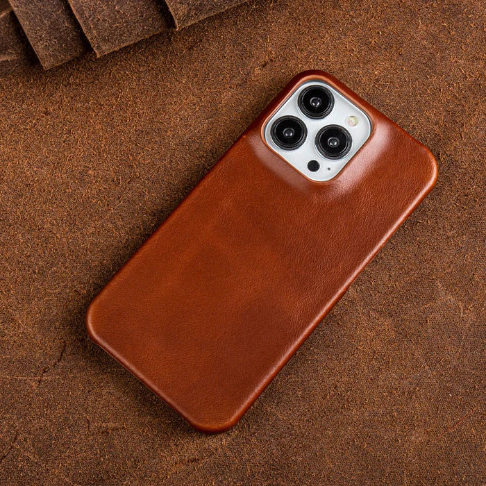 Oil-wax leather iPhone case in dark brown with raised camera cutouts