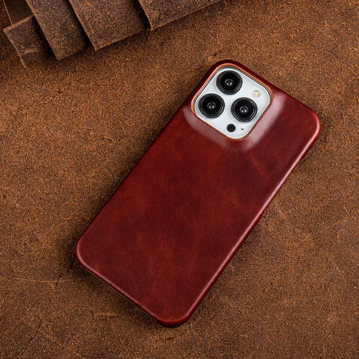 Oil-wax leather iPhone case in deep red with raised camera cutouts