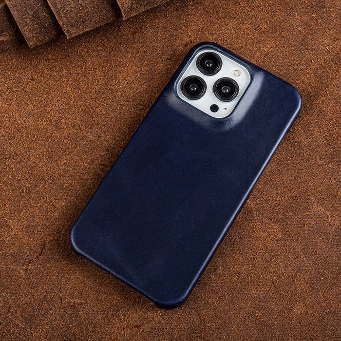 Oil-wax leather iPhone case in navy blue with raised camera cutouts