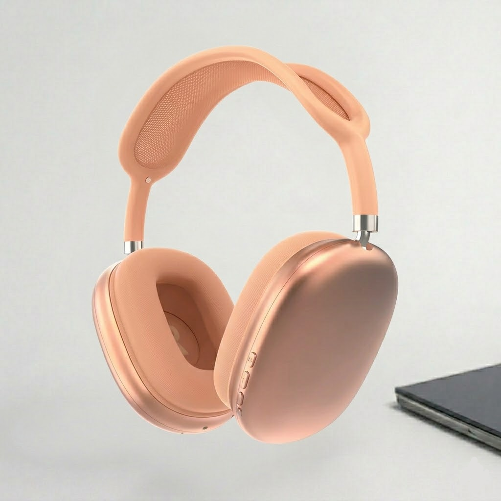 Peach over-ear noise cancelling Bluetooth headphones with padded ear cushions