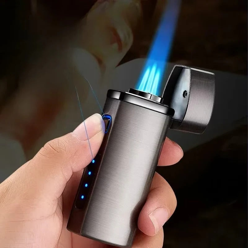 Rechargeable triple jet flame lighter with brushed metal body and blue flame, shown in hand.