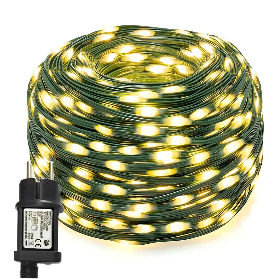 Warm white LED rope string lights coiled with inline power module