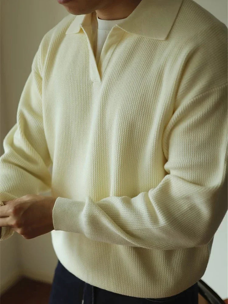 Relaxed fit polo sweater, styled front view