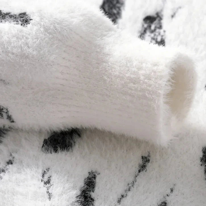 Bold artistic pattern pullover, close-up detail