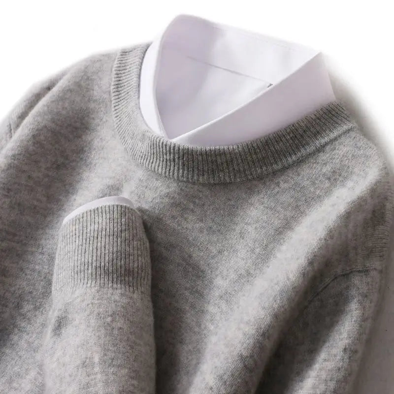 Men's ribbed crew neck sweater in gray, with ribbed neckline and sleeve cuffs.