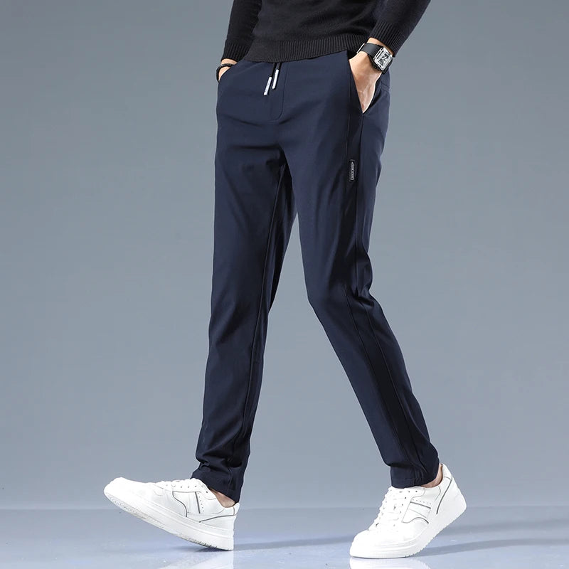Slim fit cotton trousers, styled front view