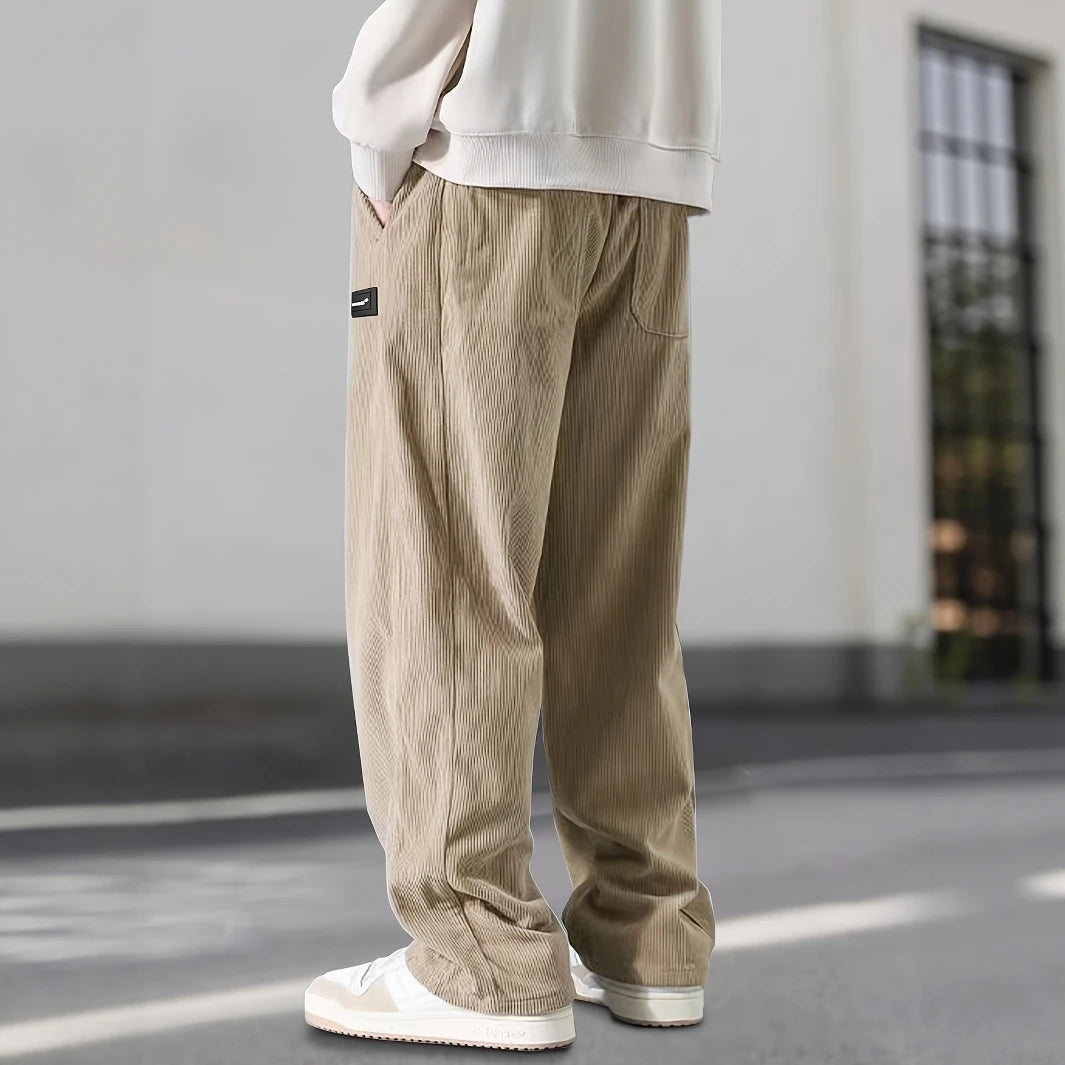 Corduroy sweatpants with deep pockets, close-up detail
