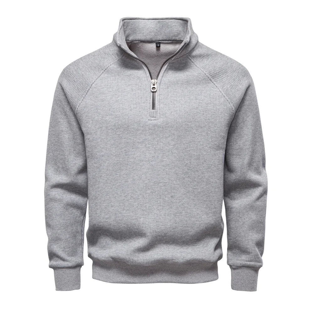 Men's gray knit half-zip sweater with ribbed stand collar