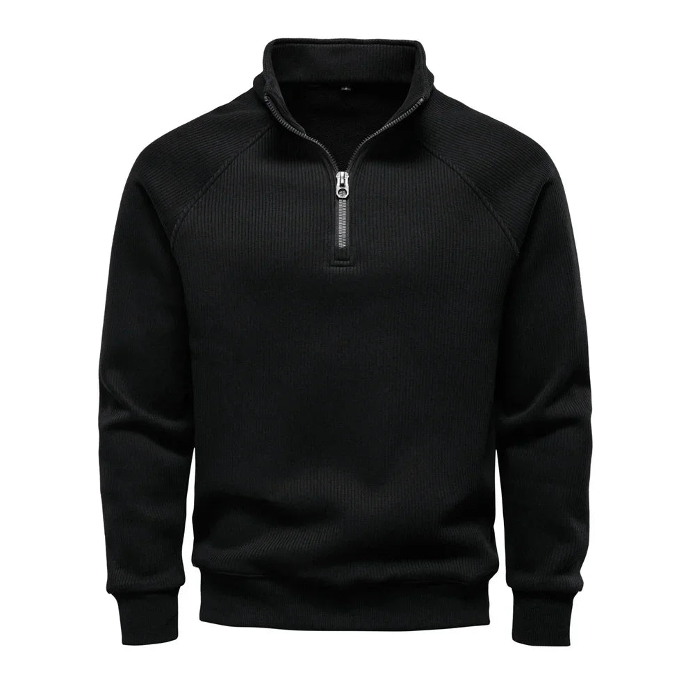Men's black knit half-zip sweater with mock neck and metal zipper