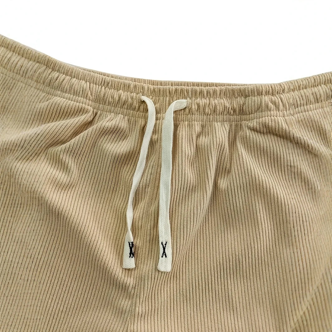 Corduroy sweatpants with deep pockets, side profile