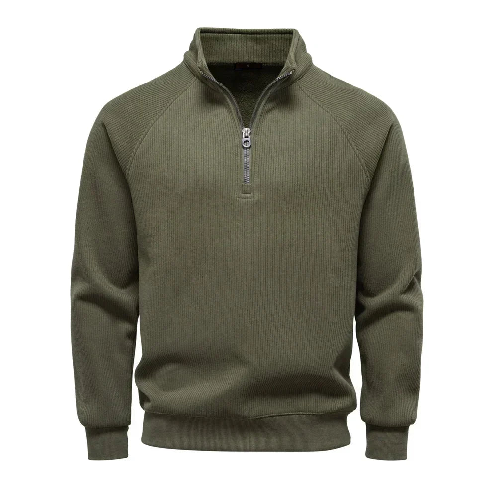 Men's green knit half-zip sweater with metal zipper and ribbed cuffs