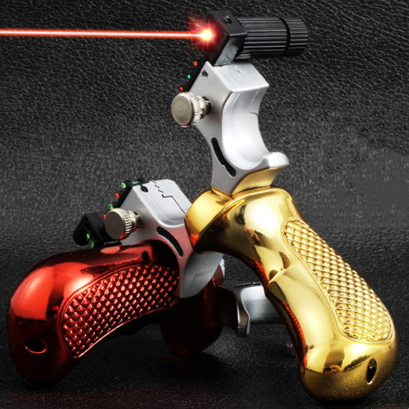 Gold and silver laser slingshot with textured grip, red laser aiming dot