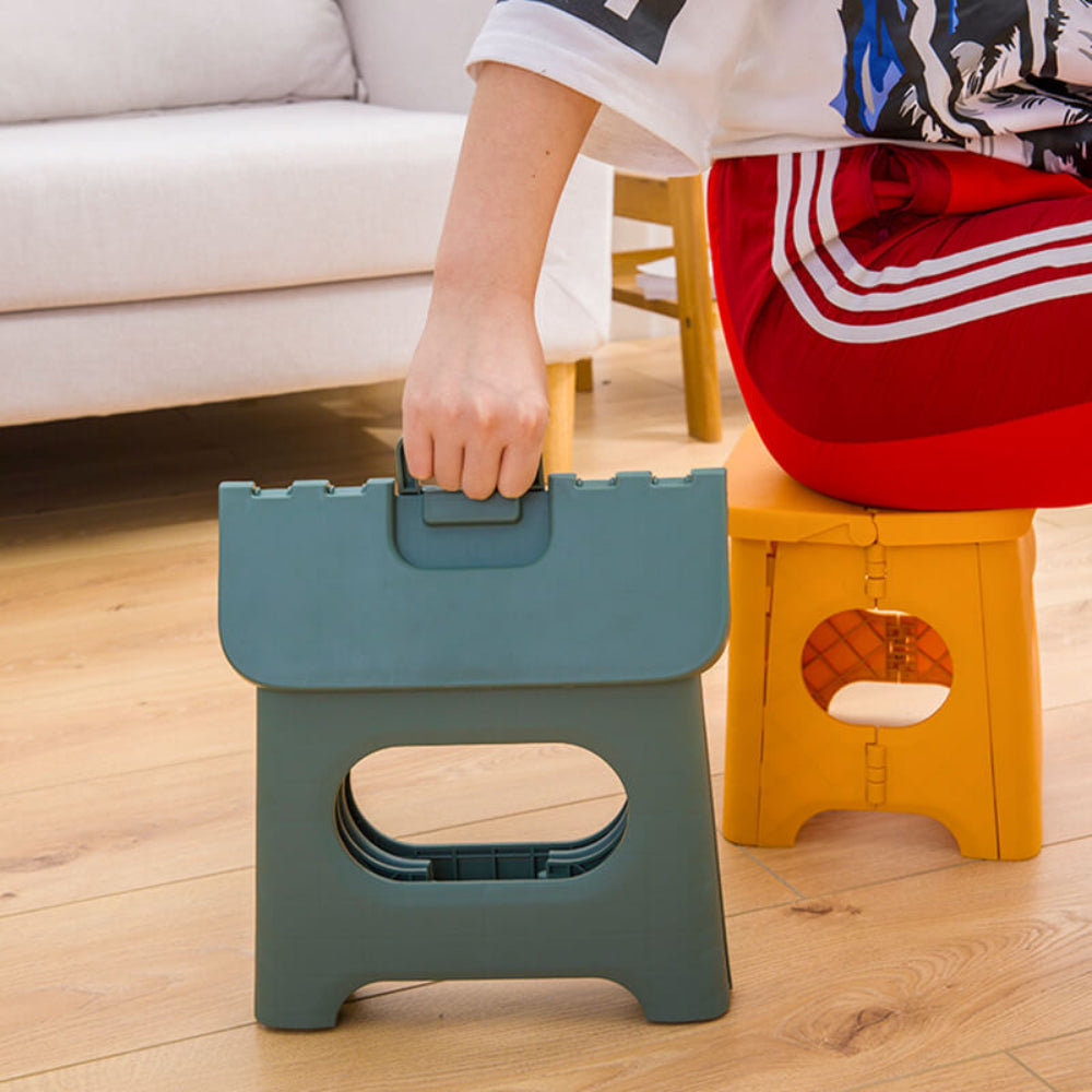 Foldable portable step stool, teal green with handle and anti-slip top