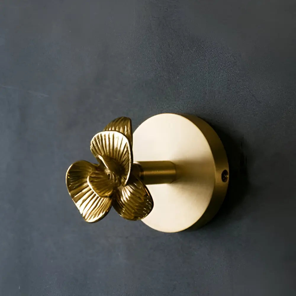 Solid brass animal wall hook with flower design, gold finish