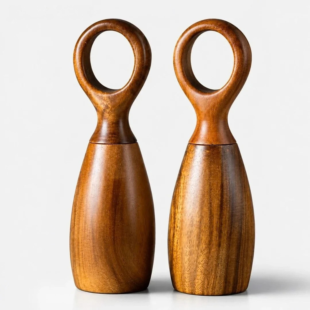 Acacia wood salt and pepper mills, matching teardrop bodies with oval handles