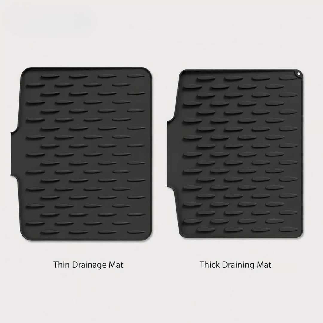 Black silicone countertop drying pad set, thin and thick drainage mats with raised bumps.