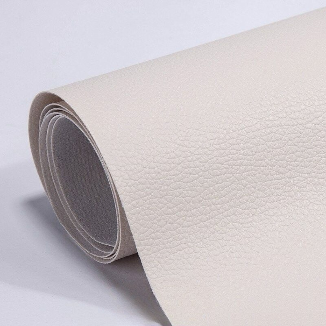 Self-adhesive leather patch repair roll in off-white with textured leather grain