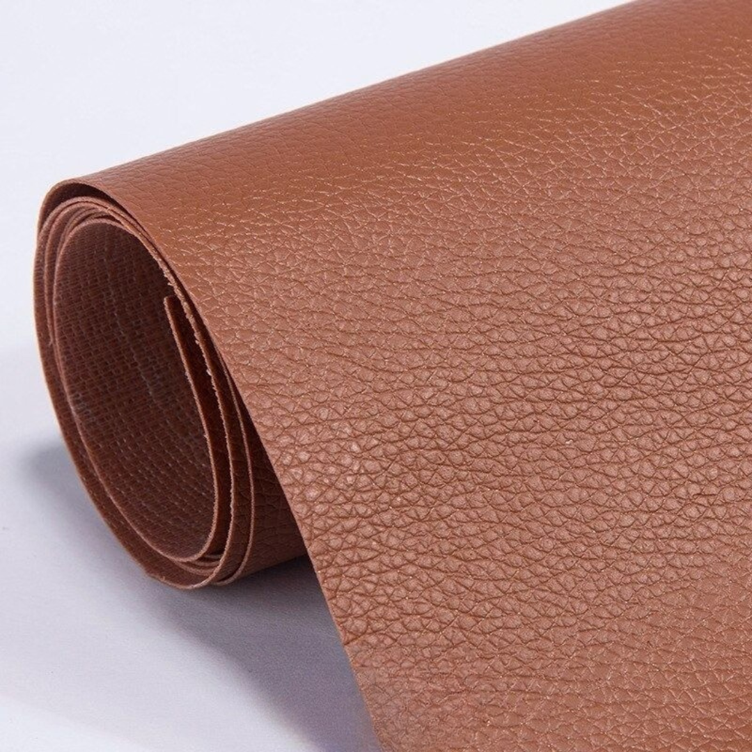 Self-adhesive leather patch repair roll in medium brown with textured leather grain