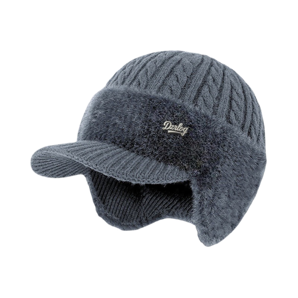 Dark gray fuzzy trapper ear flap hat with Derlog logo patch and curved brim
