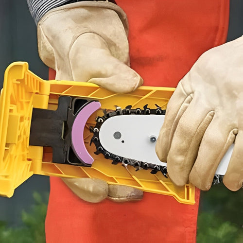 Chainsaw chain sharpener tool in bright yellow case with purple grinding wheel and glove use