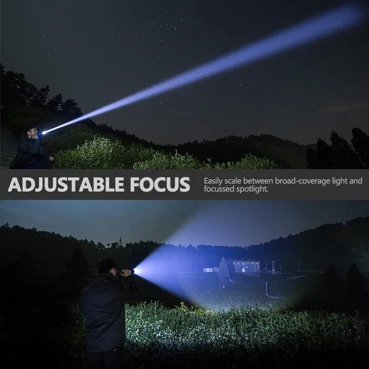 Black rechargeable flashlight projecting a wide beam in the dark