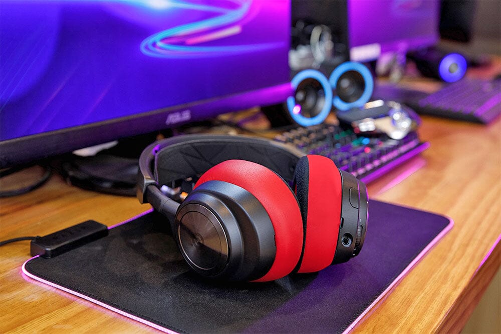 Red and black replacement earpads for over-ear wireless headphones with cushioned foam rings