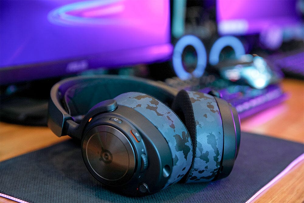 Cooling gel replacement earpads on headset, blue-gray camo with black textured foam