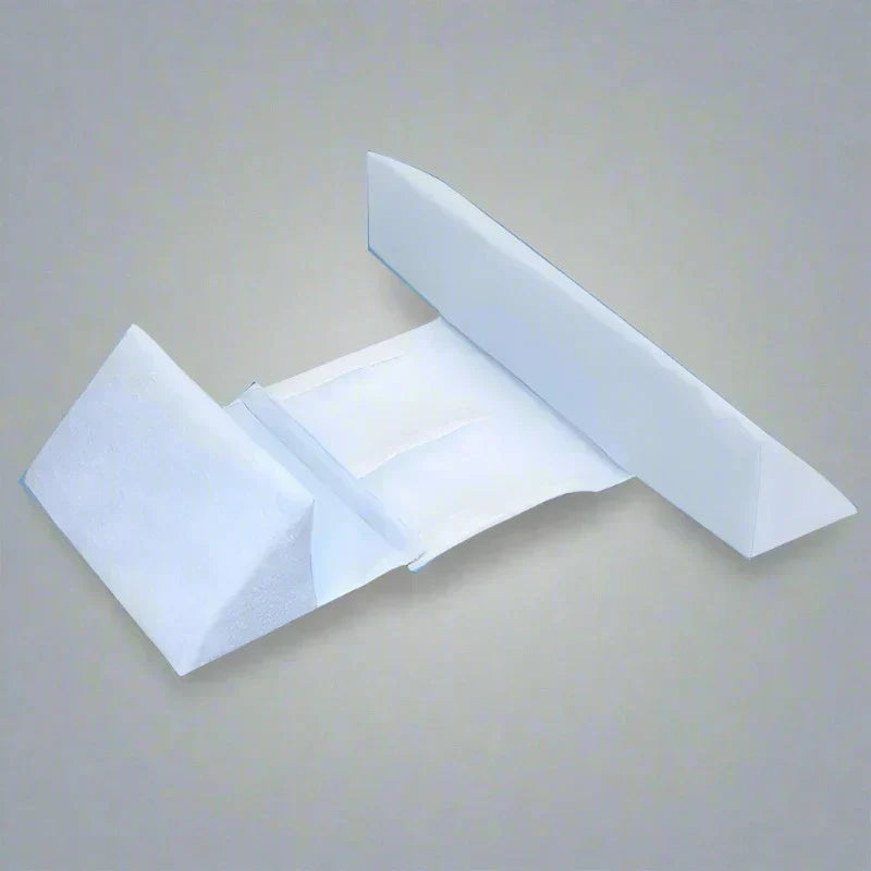 Adjustable baby side sleeper pillow with white wedge cushions and side bolsters