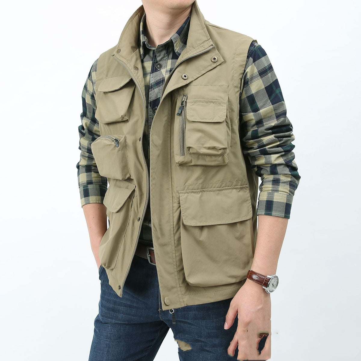 Khaki/beige utility vest with front flap pockets and snap front; sleeveless outdoor style