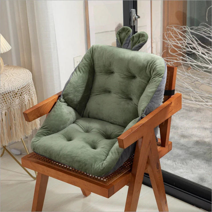 Sciatica relief cushion with green padded backrest and contoured seat