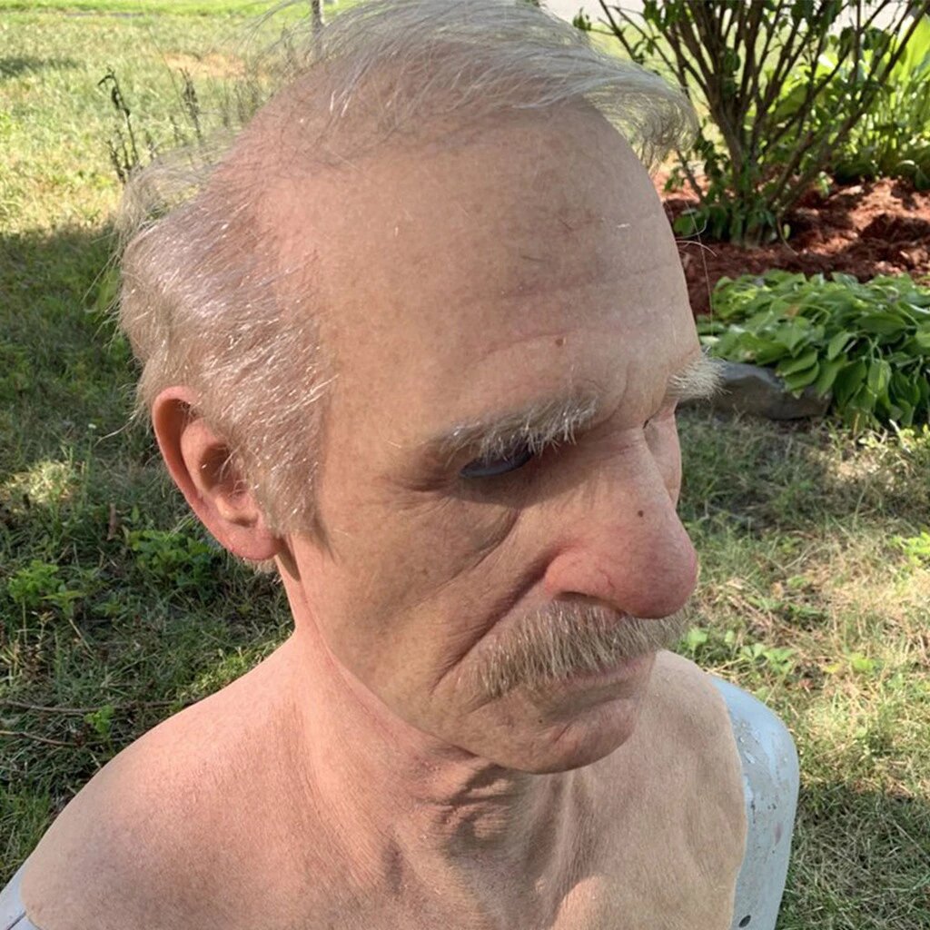 Realistic latex Halloween mask side profile with short gray hair and gray mustache