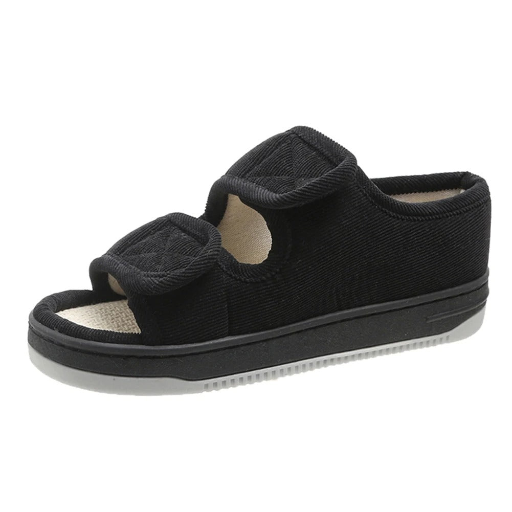 Wide-fit comfort sandals in black fabric with padded open-toe straps