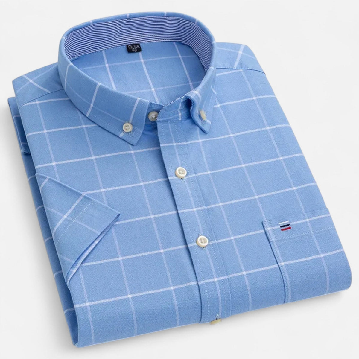 Men's short-sleeve oxford shirt in blue with light grid windowpane lines, button placket