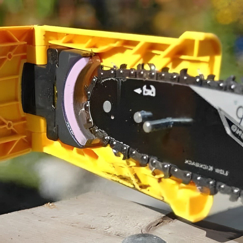 Chainsaw chain sharpener tool grinding a chain on a yellow base with purple wheel