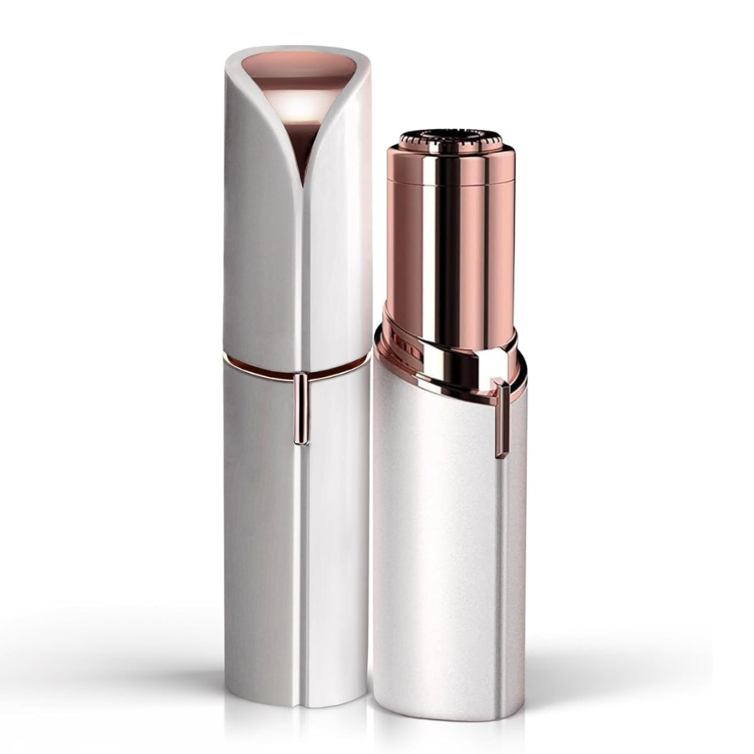 Silver and rose gold facial hair trimmer with hinged cap and blade head
