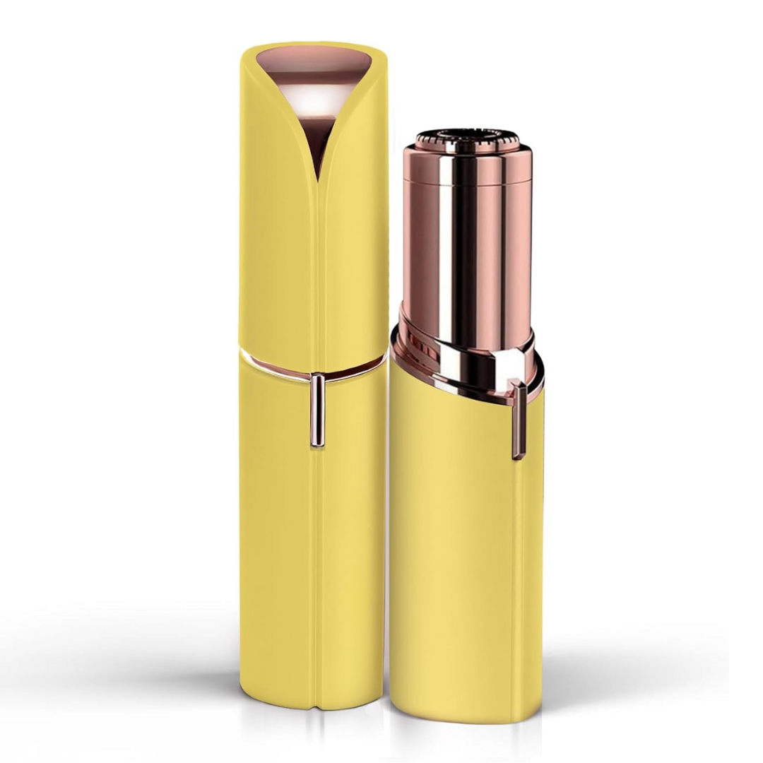 Yellow and rose gold facial hair trimmer with hinged cap and blade head