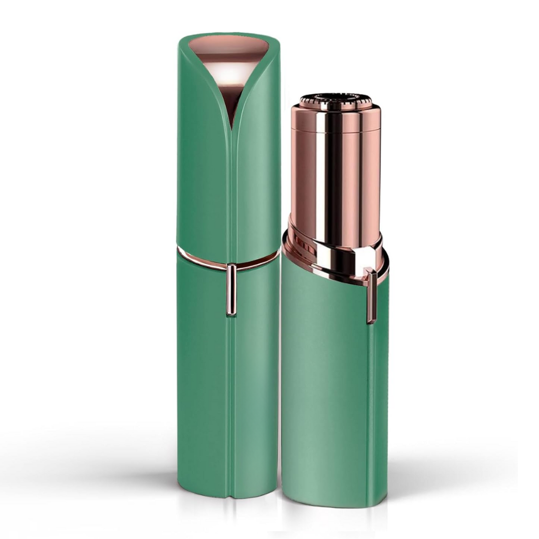 Green and rose gold facial hair trimmer with hinged cap and blade head